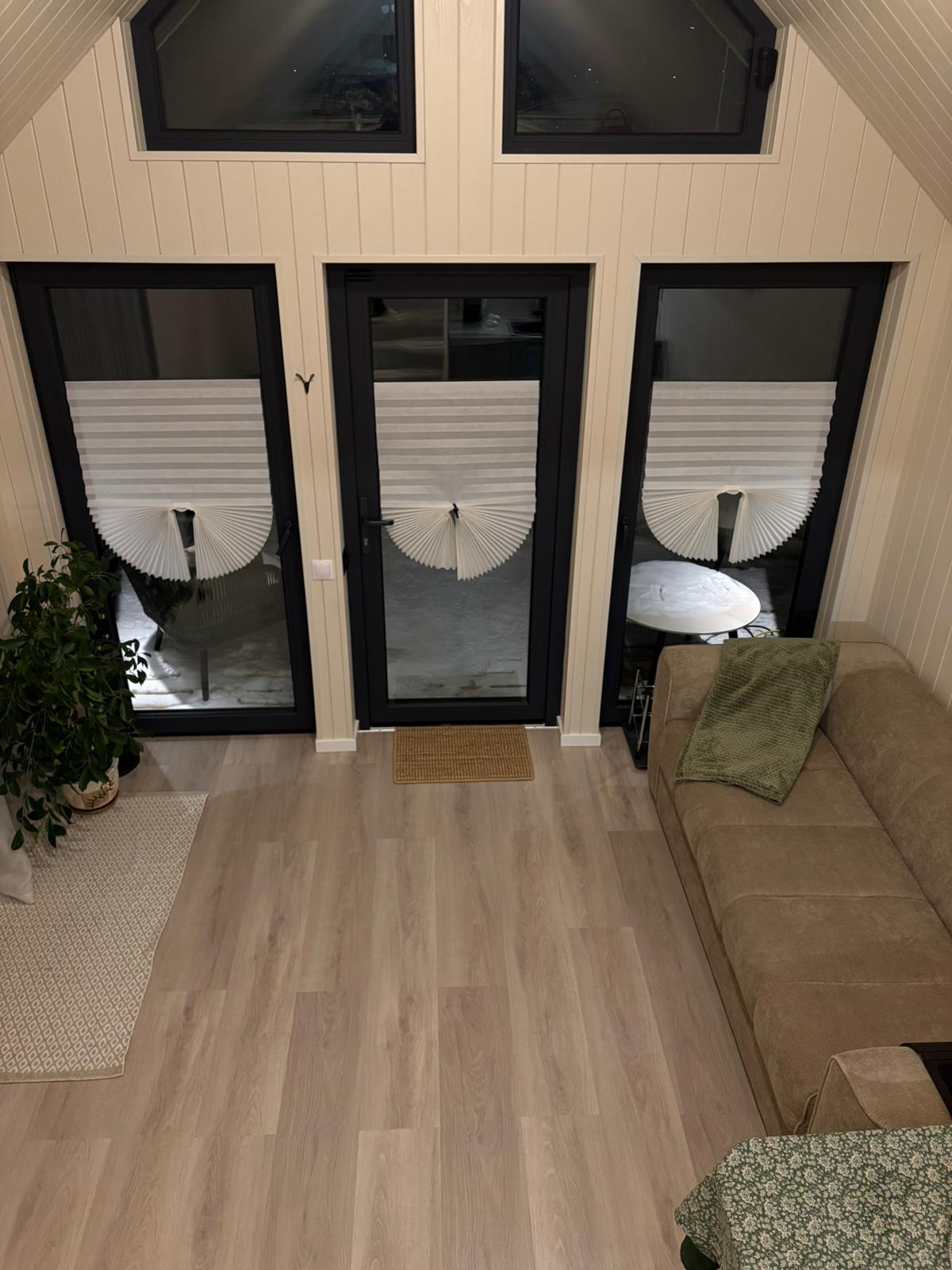 Living area with panoramic glass doors